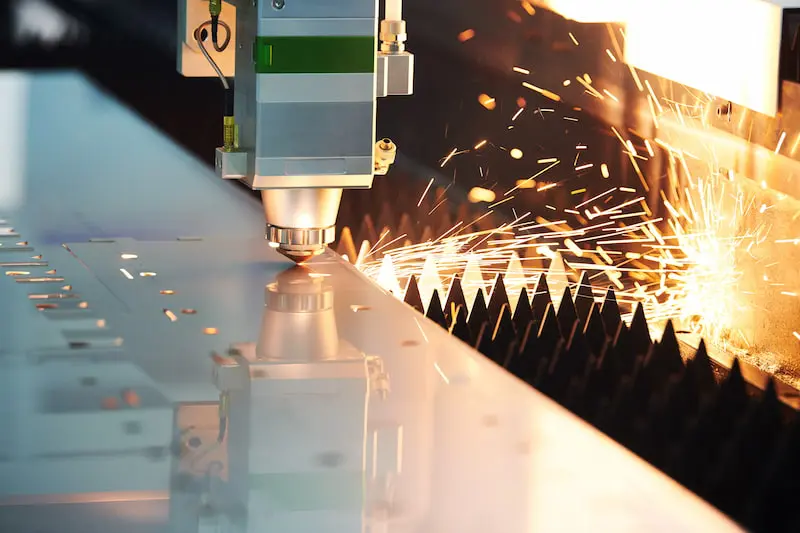 Fiber laser cutting machine in action with precision metal cutting